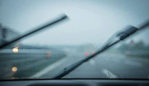 Windshield of car driving in the rain| Tips for Driving In the Rain Blog | LTrent