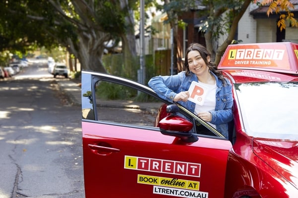 LTrent student using instructor car for test