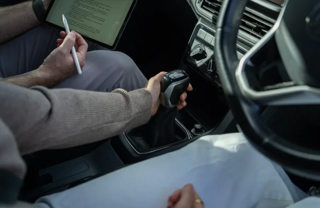 Driving instructor providing guidance as a learner practises essential driving skills.