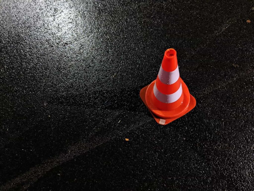 Orange and white hazard cone
